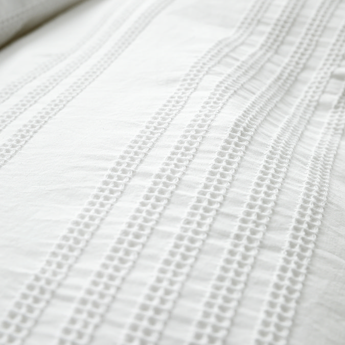 Waffle cotton stripe white close up on bed image 5