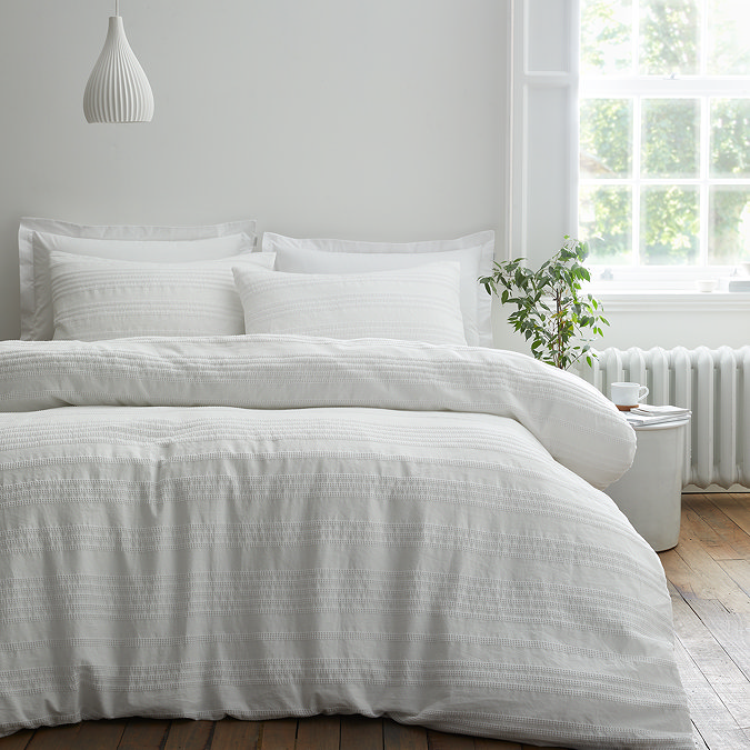 Waffle cotton stripe white on bed image 1
