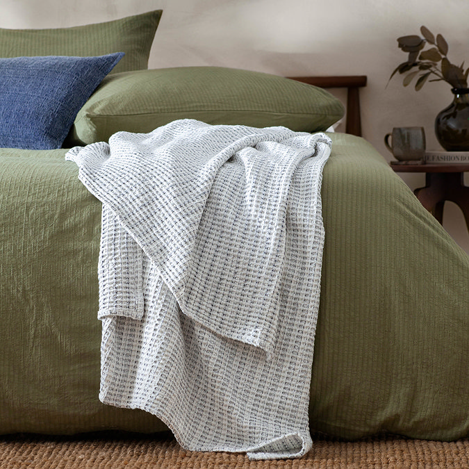 waffle textured bedspread in dusk blue