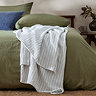waffle textured bedspread in dusk blue