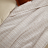 Waffle textured bedspread in natural