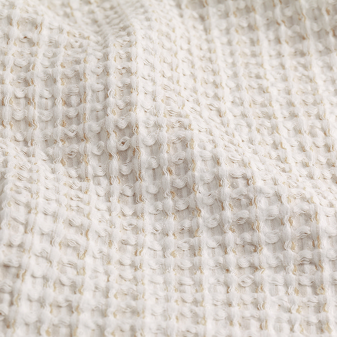 Waffle textured bedspread in natural