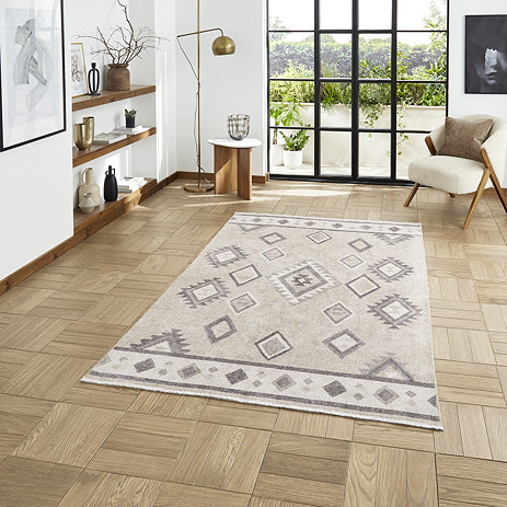 Whisper rug in beige on floor image 1