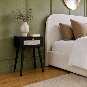 angled image of black rattan nightstand
