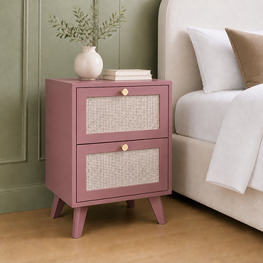 angled pink clay coloured bedside table with rattan