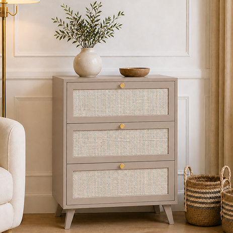 taupe three drawer chest with rattan fronts, in front of cream panelled wall