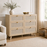 image of natural coloured rattan fronted six drawer chest on wooden flooring