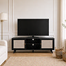 image of black rattan large tv unit against cream living room wall