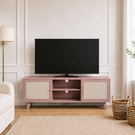 lifestyle image of pink clay coloured tv unit with rattan doors