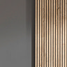 image between two sides of wardrobe, one grey side and one oak effect