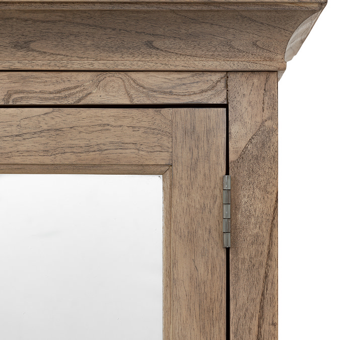 close up image on top of ashy wood wardrobe, focus on hinge and mirror