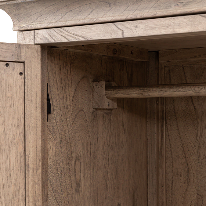 close up on inside of ashy wood wardrobe