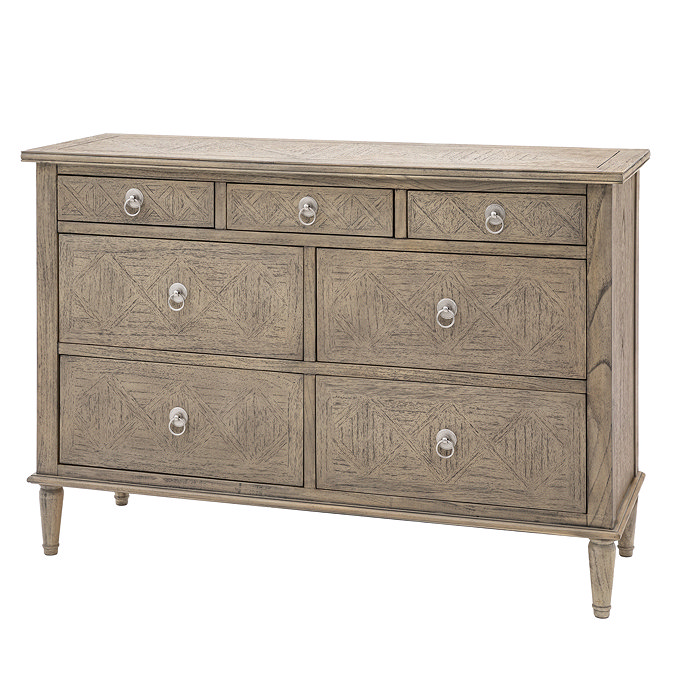 image cut out on white background of seven drawer ashy wooden chest with hoop handles and subtle wood pattern