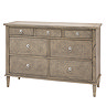 image cut out on white background of seven drawer ashy wooden chest with hoop handles and subtle wood pattern