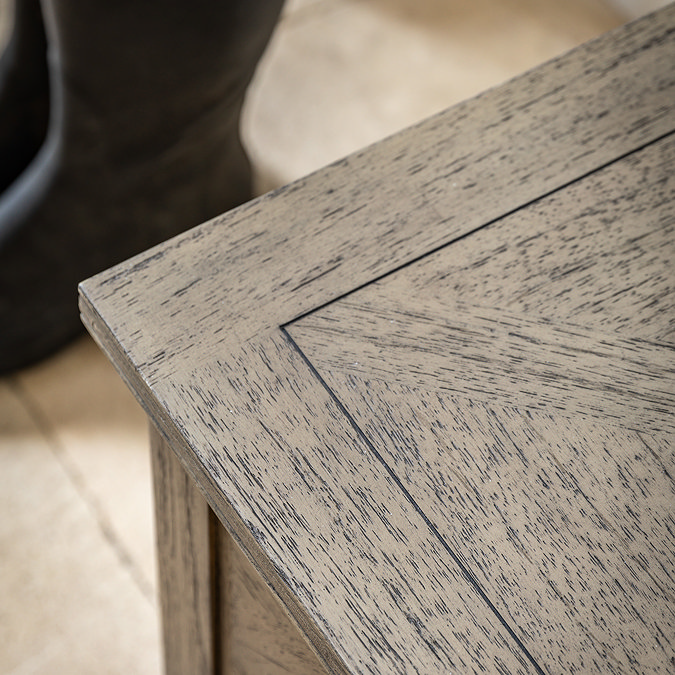 close up on subtle wood pattern of hallway bench