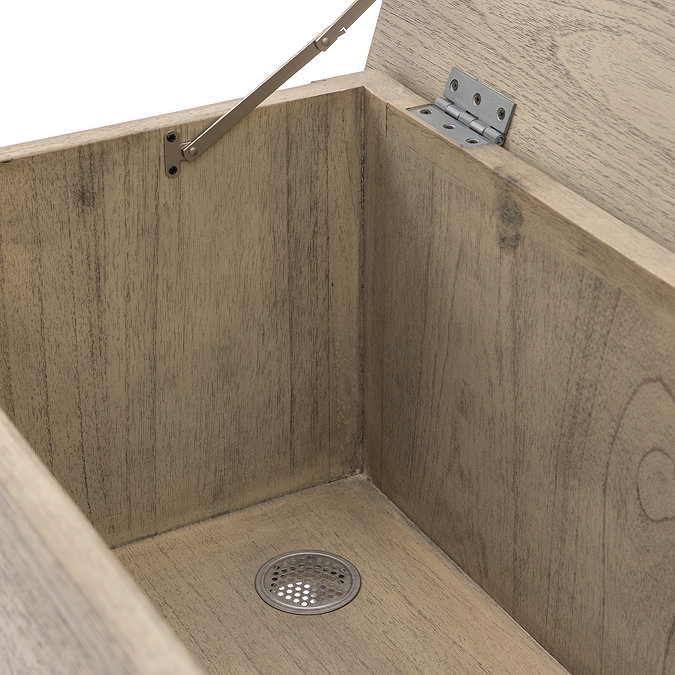 close up image of inside of ashy wooden hallway bench/chest, showing woodgrain and storage space