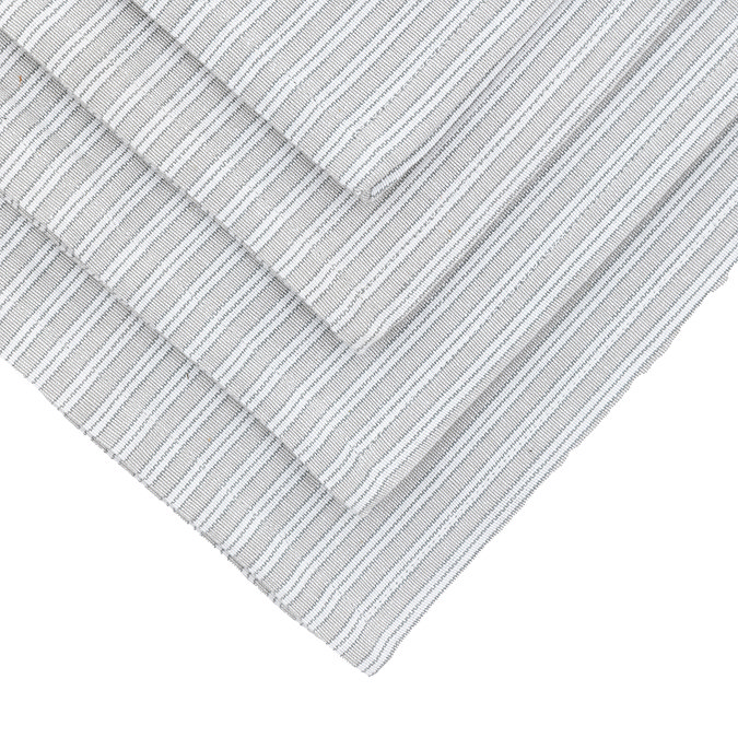 image cut out on white background of grey stripe soft cotton napkins layered on top of each other in diamond shape