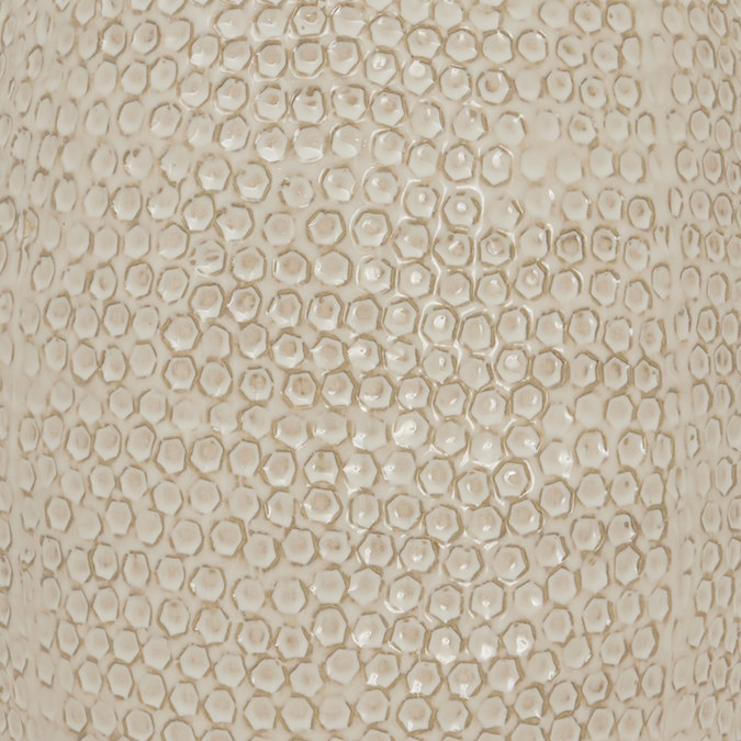 close up on texture and colour of patterned olpe vase